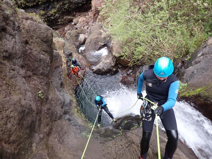 Canyoning Level 2 - Ribeira do Cidrão- Madeira Island - Level 2 action: eight rappels, the 18 m waterfall, jumps, and a 6 m toboggan