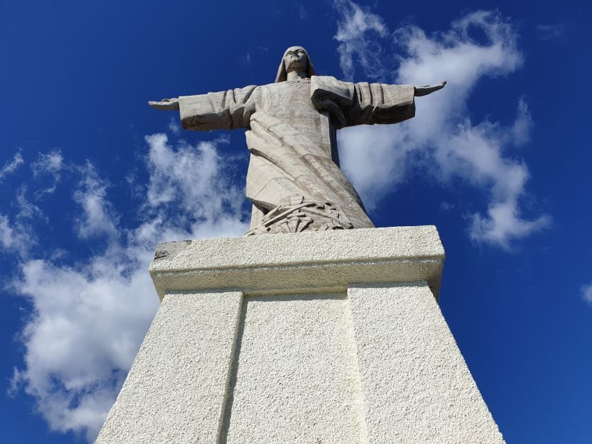 Cristo Rei & Garajau Tuk-Tuk Tour - Garajau and Cristo Rei: Cliff-Top Statue and Deep Blue Water