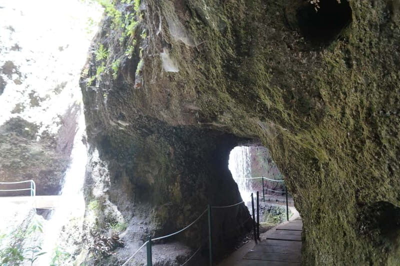 From Funchal: Levada Nova Hiking Tour with stopover at beach - Stone Bridges, Wet Waterfalls, and The Tunnel Moment