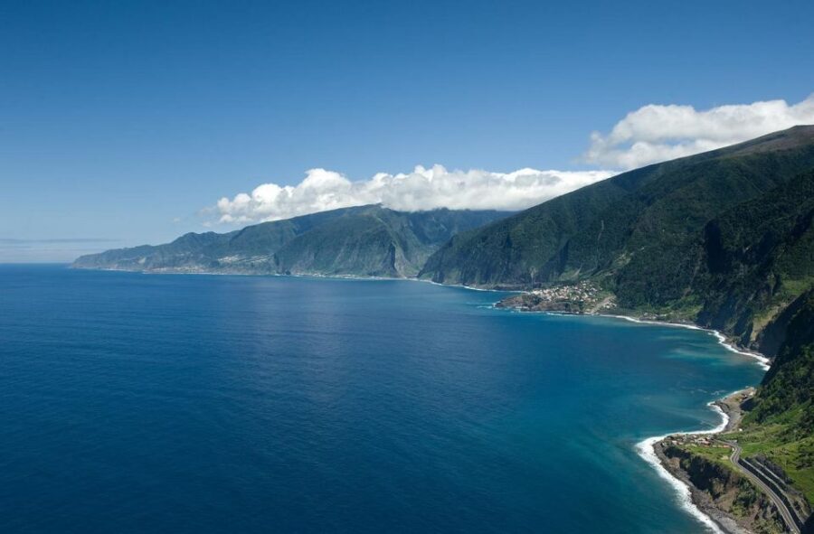 Madeira: Full-Day Porto Moniz Jeep Tour - Paúl da Serra plateau: open air, clouds below, and the Atlantic horizon