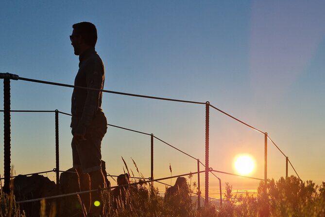 Sunrise in Areeiro Peak - Stop 3: Miradouro do Guindaste glasswalk over the north coast (Faial, Santana district)